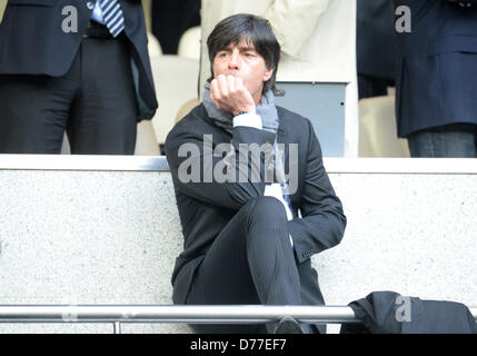 Head coach of the German national soccer team Joachim Loew is seen in the stands before the UEFA Champions League semi final second leg soccer match between Borussia Dortmund and Real Madrid at Santiago Bernabeu stadium, Spain, 30 April 2013. Photo: Bernd Thissen/dpa Stock Photo
