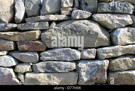 Closeup of traditional dry stone wall in countryside. Stock Photo