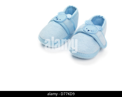 Baby boy blue shoes isolated on white background