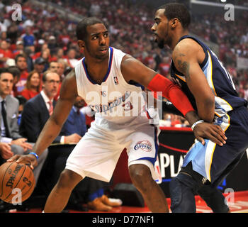 Los Angeles, CA. April 30, 2013. Los Angeles Clippers point guard Chris Paul #3 moves the ball asMemphis Grizzlies point guard Mike Conley #11 defends in the first half of the NBA Basketball playoff game 5 between the Memphis Grizzlies and the Los Angeles Clippers at Staples Center in Los Angeles, California..Louis Lopez/CSM/Alamy Live News Stock Photo