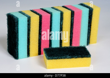 Sponge scourers against a grey background. Stock Photo