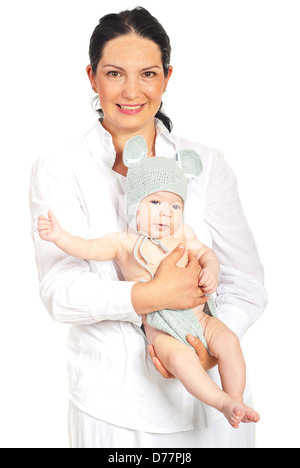 Happy mother holding newborn baby boy in crochet mouse costume isolated on white background Stock Photo