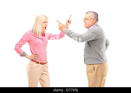 An agry female and mature man arguing isolated on white background Stock Photo