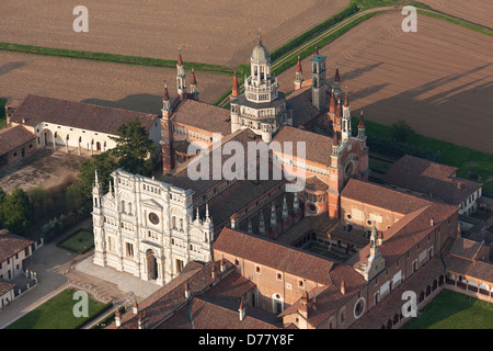 AERIAL VIEW. Carthusian monastery south of Milan, in the Po Valley. Certosa di Pavia, Province of Pavia, Lombardy, Italy. Stock Photo