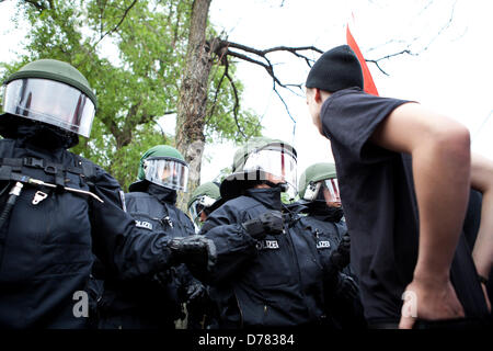 Berlin, Germany. May 1st 2013.  A protester confronts police during a protest against NPD . Credit: Rey T. Byhre /Alamy Live News Stock Photo