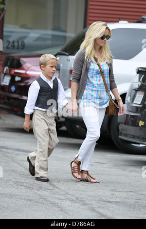 Reese Witherspoon, her son Deacon Phillippe and husband Jim Toth attend church services on Father's Day in Santa Monica Los Stock Photo