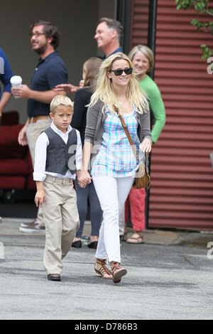 Reese Witherspoon, her son Deacon Phillippe and husband Jim Toth attend church services on Father's Day in Santa Monica Los