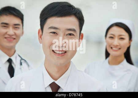 Portrait of Healthcare workers in China, Two Doctors and Nurse Stock Photo