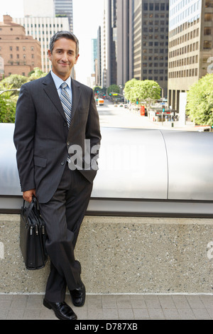 Portrait Of Businessman Standing Outside Office Stock Photo