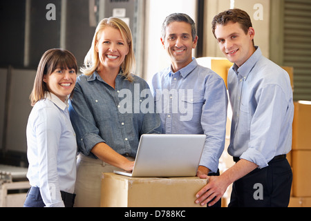 Portrait Of Workers In Distribution Warehouse Stock Photo