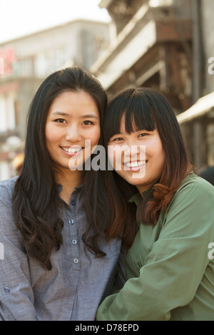 Portrait of two young friends in Beijing outdoors Stock Photo