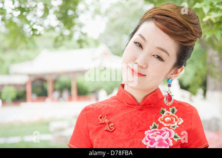 Young Woman with Qipao Stock Photo