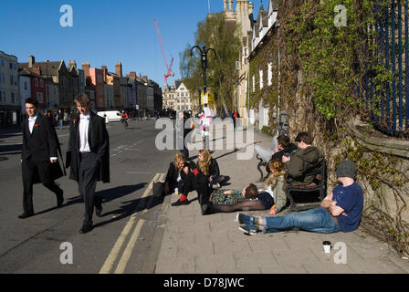 Oxford, England 1st May 2013. Oxford University students May Day celebrations, the morning after the night before, drunk and disorderly  while other students its academia as usual. 2010s UK.  HOMER SYKES Stock Photo