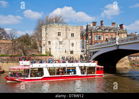 York river boat cruise on the river Ouse going under Lendal bridge York city centre North Yorkshire England UK GB EU Europe Stock Photo