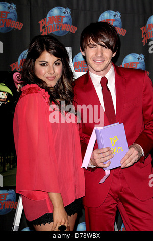 Daniella Monet and Drake Bell appear at Planet Hollywood to promote the new Nickelodeon live-action TV movie 'A Fairly Odd Stock Photo