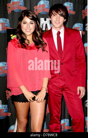 Daniella Monet and Drake Bell appear at Planet Hollywood to promote the new Nickelodeon live-action TV movie 'A Fairly Odd Stock Photo