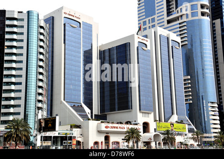 futuristic tower Crowne Plaza hotel financial district Sheikh Zayed Road Dubai UAE Stock Photo