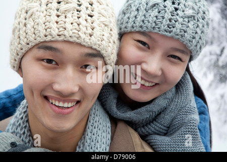 Young Couple in the Snow Stock Photo