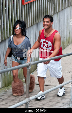 Nicole Polizzi aka Snooki and Jionni LaValle Nicole Polizzi aka Snooki in good spirits as she walks the boardwalk with her Stock Photo