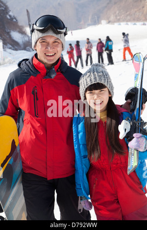 Smiling Father and Daughter in Ski Resort, portrait Stock Photo