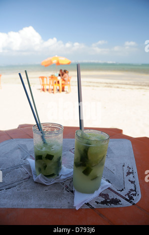 Capirinhas at Beachside Cafe on Ilha de Itaparica with Salvador in Background Stock Photo