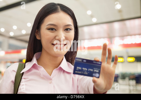 Businesswoman Showing Credit Card Stock Photo