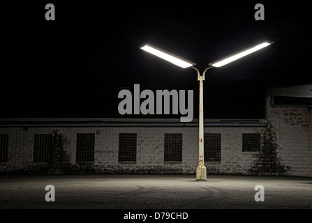Old Lights & Building At Night Stock Photo