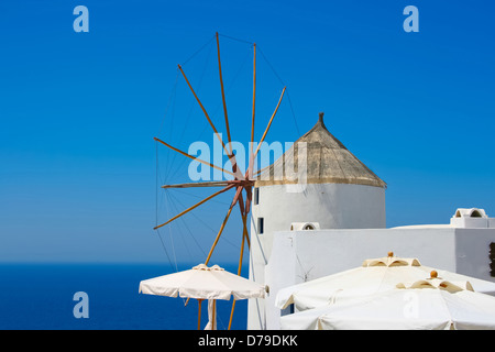 Windmill in Oia village on island of Santorini, Greece Stock Photo