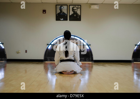 Martial Arts Dojo Kneeling Bow Stock Photo