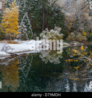 Yosemite National Park, California: Late autumn snowfall along the Merced River's Sentinel Beach in Yosemite Valley Stock Photo