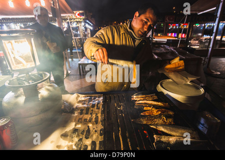 Fish Kebab sandwiches vendor and stall at night. Istanbul, Turkey Stock Photo