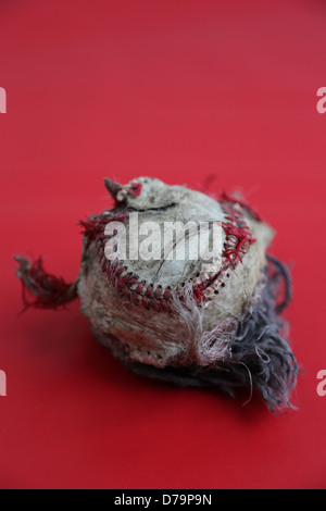 A torn up baseball. Stock Photo