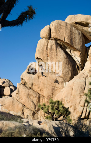 Rock climbers at Joshua Tree National Monument in California Stock Photo