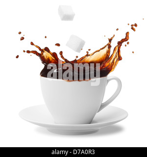 sugar cube being dropped into coffee creating splash Stock Photo