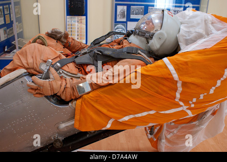 Vostok Space Suit type worn by Yuri Gagarin posed in ejection seat in museum Baikonur Space Museum Baikonur Cosmodrome Stock Photo