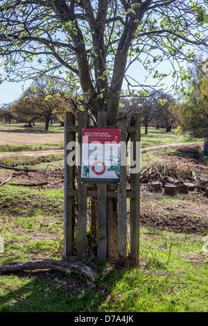 Richmond Park, Greater London, UK. 1st May 2013.  Richmond Park is home to large herds of red deer and fallow deer. Signs have been posted advisng vistors to take precautions during mating and birthing seasons. Credit: Eden Breitz/Alamy Live News Stock Photo