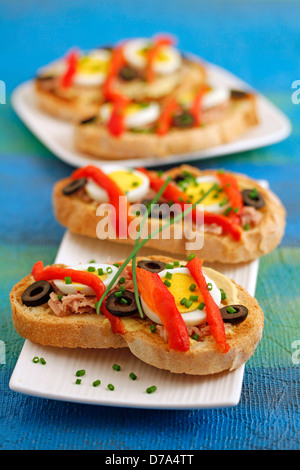 Bruschettas with tuna and peppers. Recipe available Stock Photo