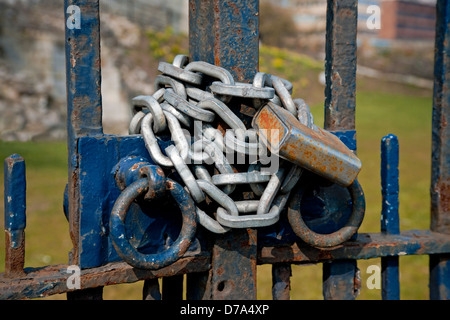 Close up of Chained and padlocked gates chain padlock England UK United Kingdom GB Great Britain Stock Photo