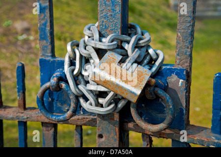Close up of Chained and padlocked gates chain padlock England UK United Kingdom GB Great Britain Stock Photo