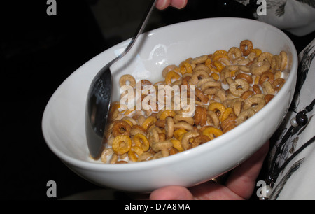 Cheerios breakfast cereal in bowl Stock Photo