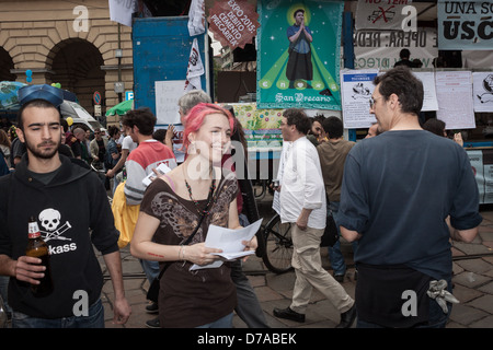 Milan, Italy - May 1, 2013: People march in the streets for the traditional May Day parade Stock Photo