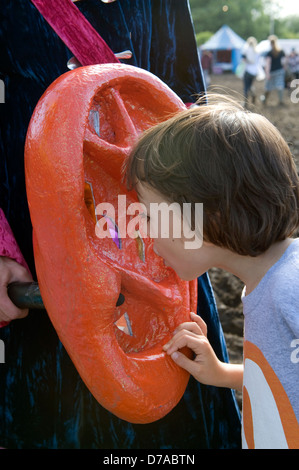 Quirky acts and people at the Glastonbury festival in Summer. Stock Photo