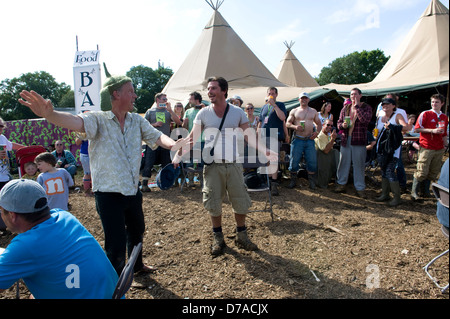 Quirky acts and people at the Glastonbury festival in Summer. Stock Photo