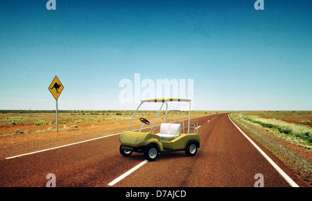 golf cart in a desert road Stock Photo