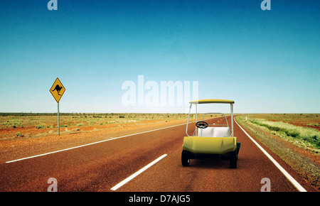 golf cart in a desert road Stock Photo