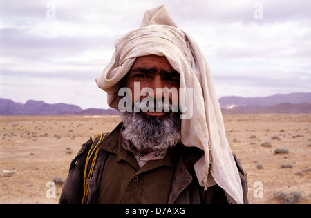 Bedouin nomad member of the Zawaideh tribe, native to the deserts of southern Jordan and western Saudi Arabia in Wadi Rum desert known also as the Valley of the Moon in Southern Jordan Stock Photo