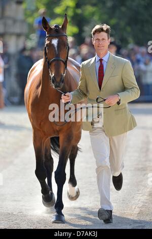 Badminton, UK. 2nd May 2013.  William Fox-Pitt [GBR] and Parklane Hawk trot up before the ground jury at the first horse inspection at The Mitsubishi Motors Badminton Horse Trials.  The Mitsubishi Motors Badminton Horse Trials take place between the 2nd and 6th of May 2013. Picture by Stephen Bartholomew/ Alamy Live News Stock Photo