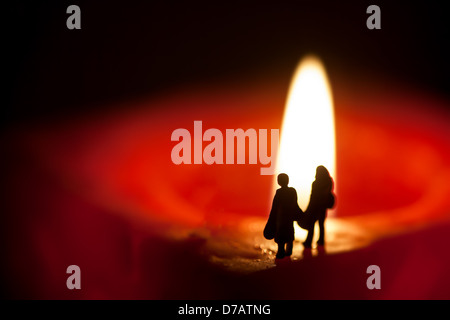 Man and Woman with a candle light Stock Photo
