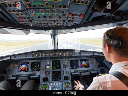 View from cockpit on Airbus 320 taking off from Dublin Airport Stock Photo