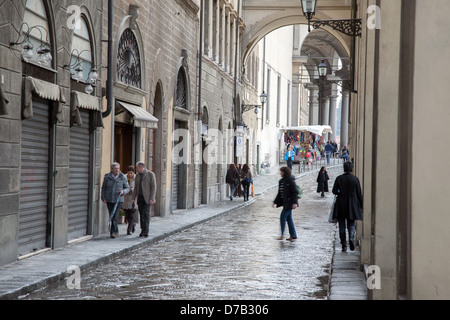 Woman Crossing Road in Lungarno Generale Diaz Street, Florence, Italy Stock Photo